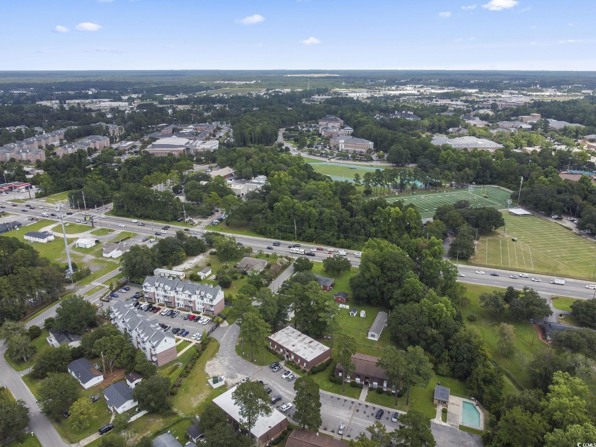 615 Carter Lane, Unit A1 Conway, SC 29526 - Photo 10 of 31 Aerial view of property's location featuring a tree filled landscape and a highway