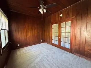 wooden floor and window in an empty room