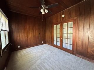 311 Pershing Way, Unit 2 West Palm Beach, FL 33401 - Photo 6 of 9 wooden floor and window in an empty room