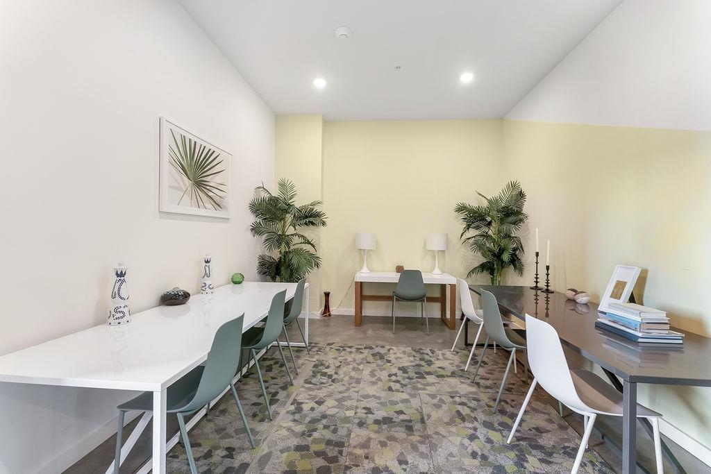 1 Flagship Street, Unit 208 Bayonne, NJ 07002 - Photo 23 of 32 a view of a dining room with furniture