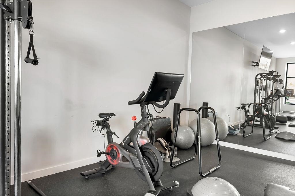 1 Flagship Street, Unit 208 Bayonne, NJ 07002 - Photo 27 of 32 a room with gym equipment