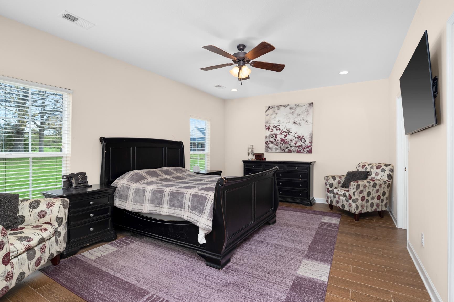 504 Bankston Road Nesbit, MS 38651 - Photo 16 of 39 Spacious room featuring wood-finish flooring, light-toned walls, and a ceiling fan with integrated lighting