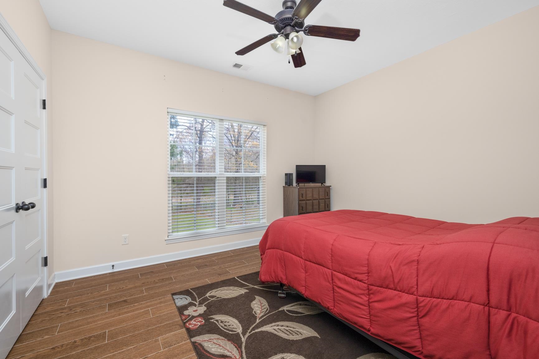 504 Bankston Road Nesbit, MS 38651 - Photo 22 of 39 Bright room featuring wood-finish flooring and a ceiling fan with integrated lighting