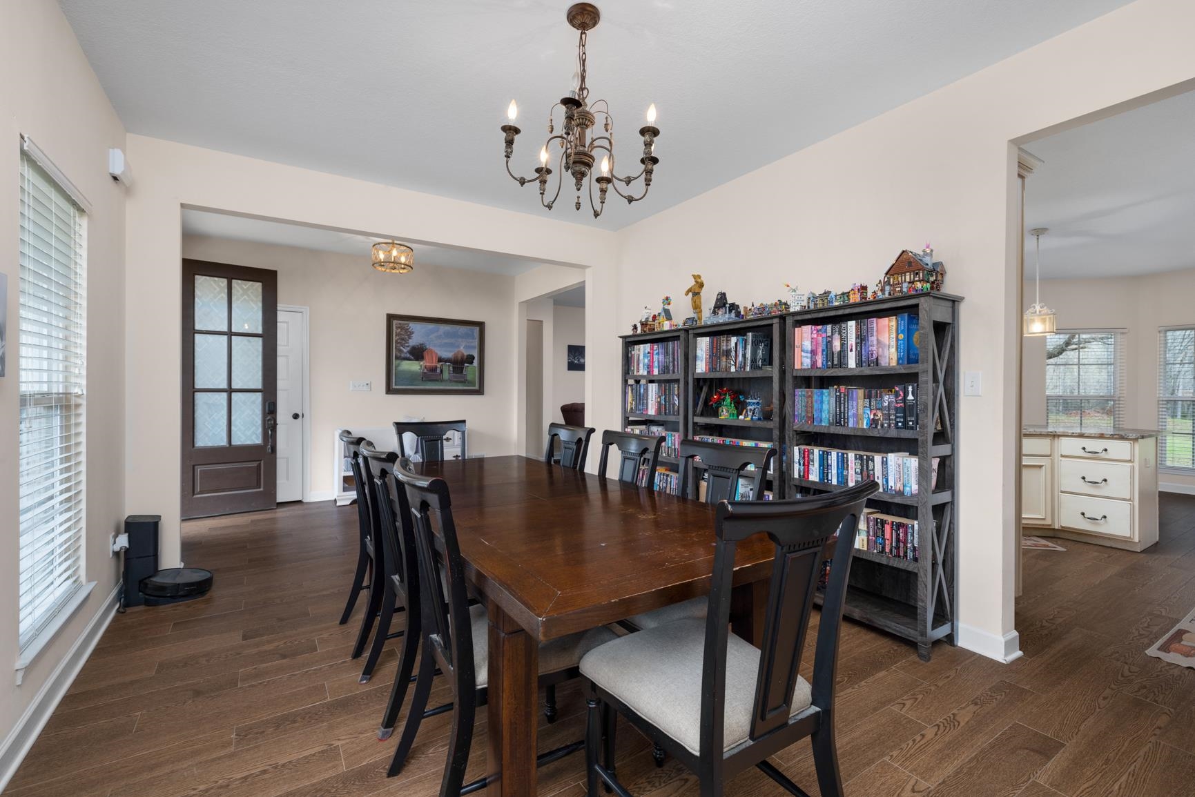 504 Bankston Road Nesbit, MS 38651 - Photo 8 of 39 Spacious interior room featuring wood-finish flooring, a decorative chandelier, and light neutral wall colors