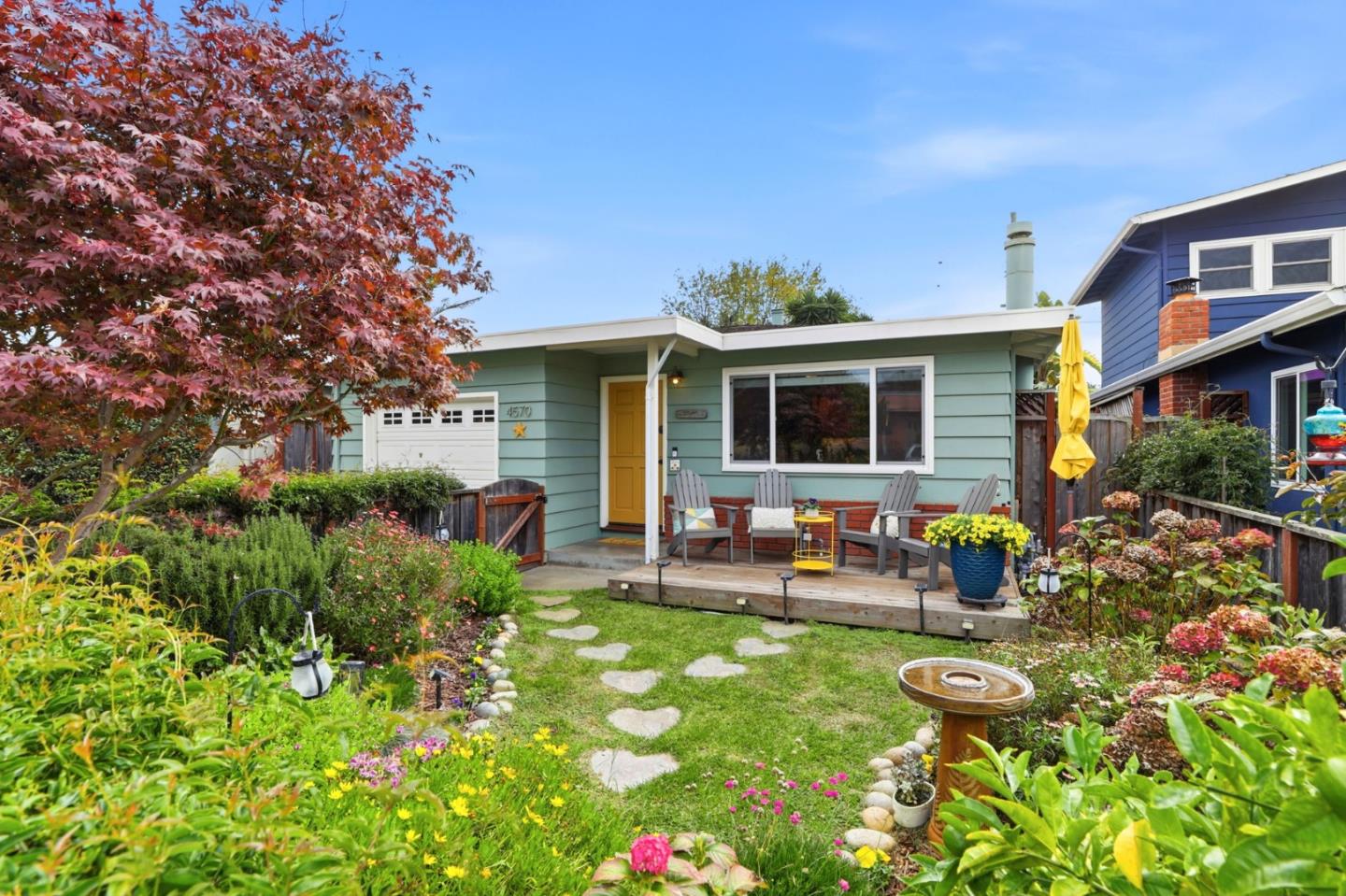 4570 Jewel Street Capitola, CA 95010 - Photo 2 of 45 a front view of house with yard and seating area