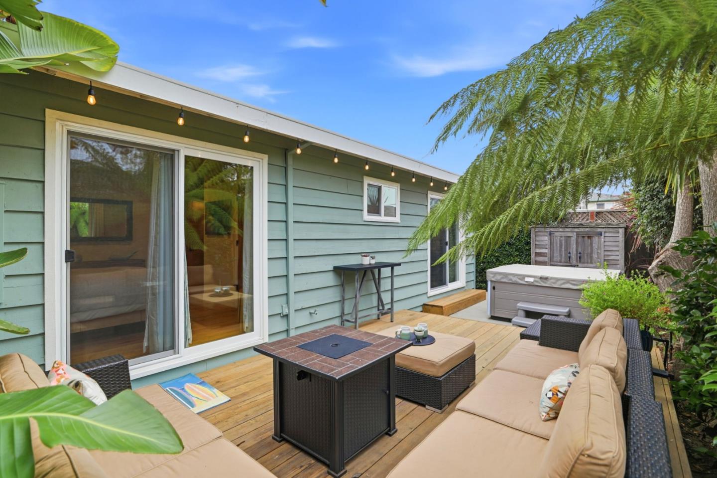 4570 Jewel Street Capitola, CA 95010 - Photo 22 of 45 a backyard of a house with outdoor seating