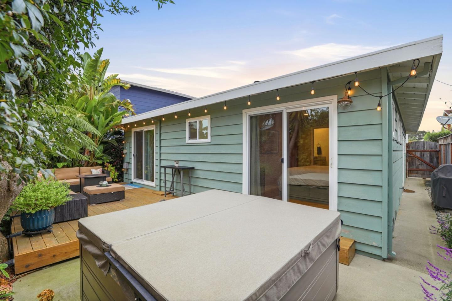 4570 Jewel Street Capitola, CA 95010 - Photo 26 of 45 a view of a house with backyard and sitting area