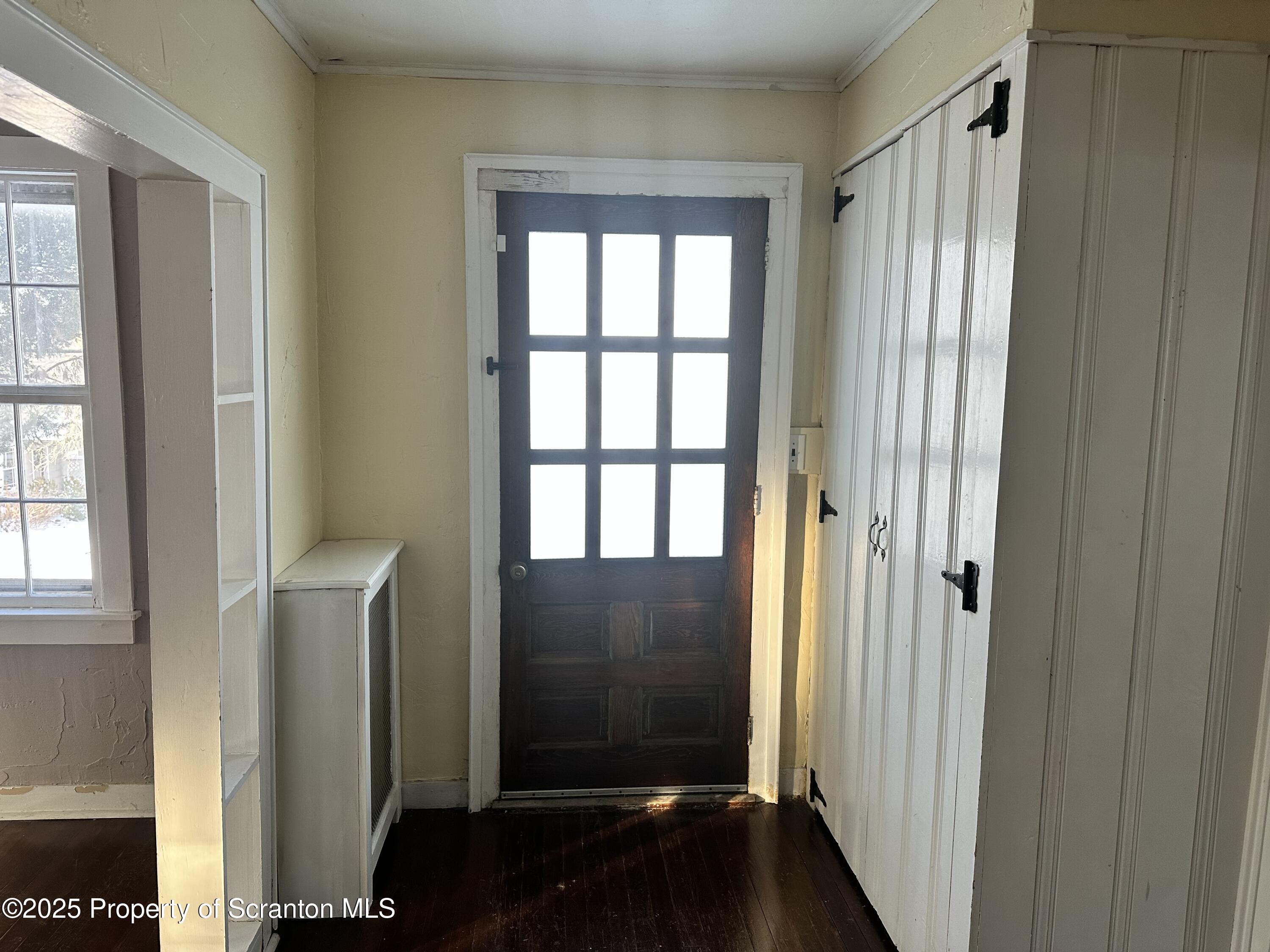 1108 North Abington Road Waverly, PA 18471 - Photo 21 of 32 a view of front door with wooden floor