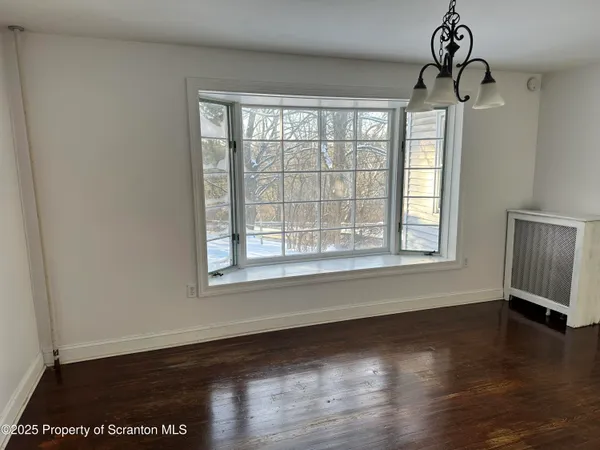 a room with furniture and window