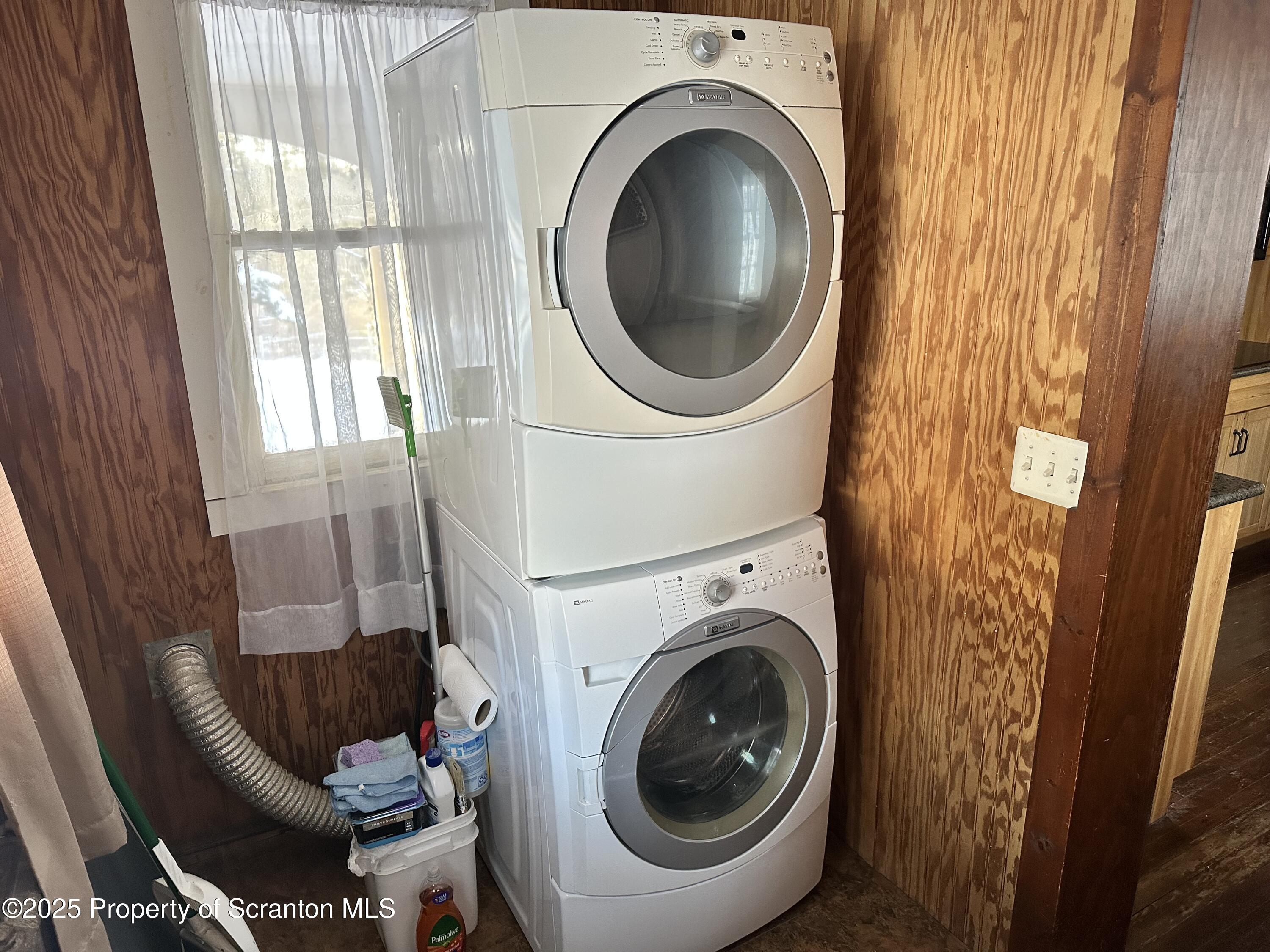 1108 North Abington Road Waverly, PA 18471 - Photo 4 of 32 a utility room with dryer and washer