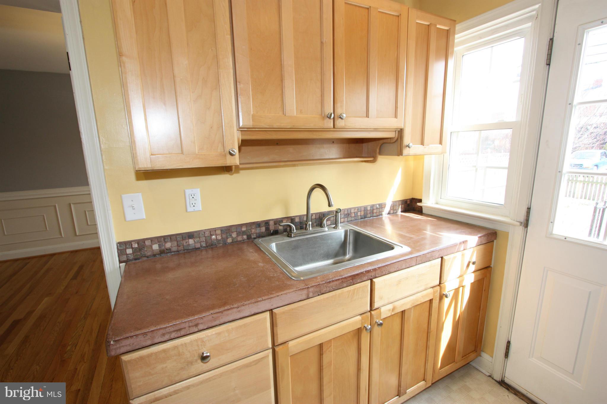 8135 Pleasant Plains Road Towson, MD 21286 - Photo 8 of 30 BEAUTIFUL CABINETRY AND STAINLESS STEEL SINK