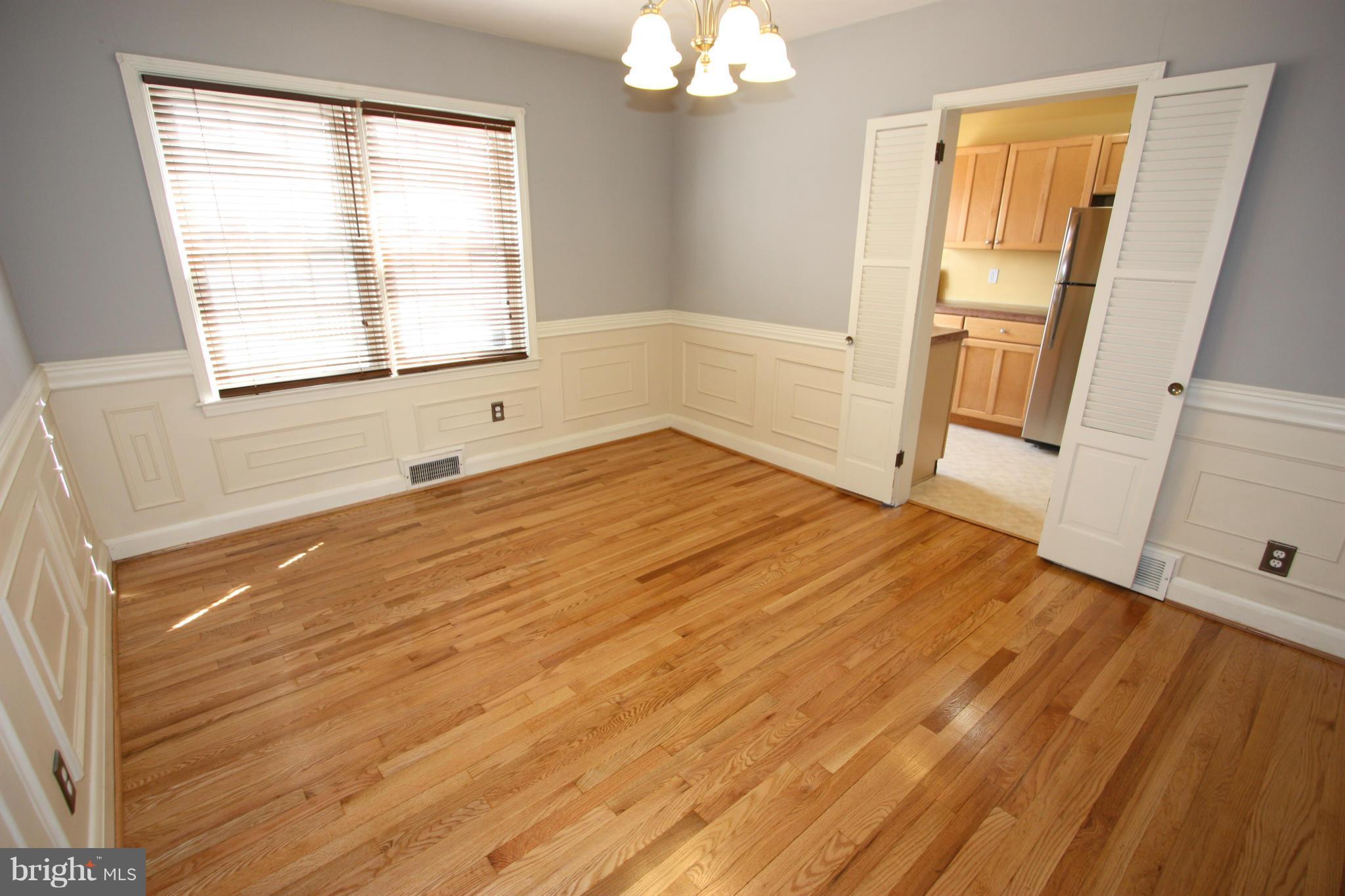 8135 Pleasant Plains Road Towson, MD 21286 - Photo 9 of 30 DINING ROOM HAS LOUVERED DOORS TO THE KITCHEN