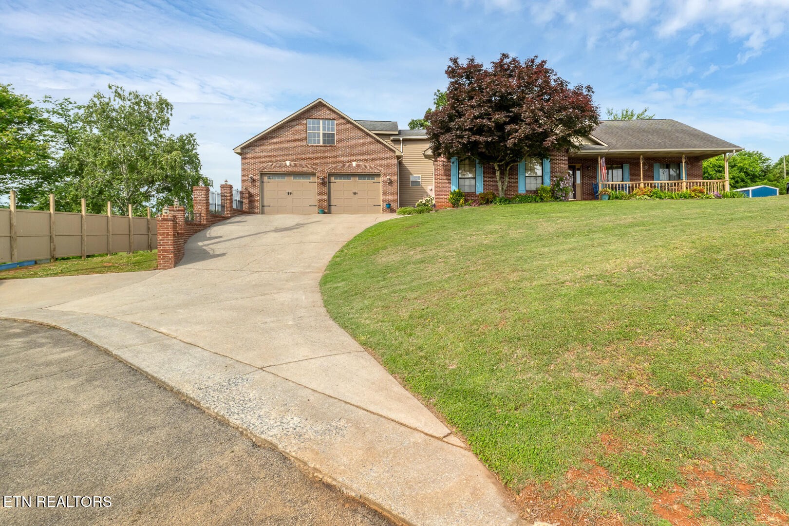 449 Foss Road Maryville, TN 37801 - Photo 11 of 49 a front view of a house with a yard and trees
