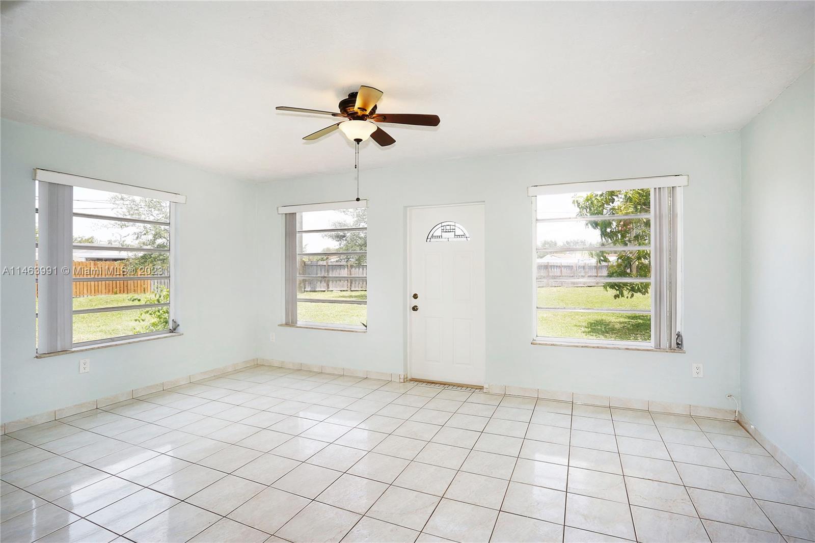 10045 Southwest 82nd Street Miami, FL 33173 - Photo 18 of 31 a view of an empty room and window