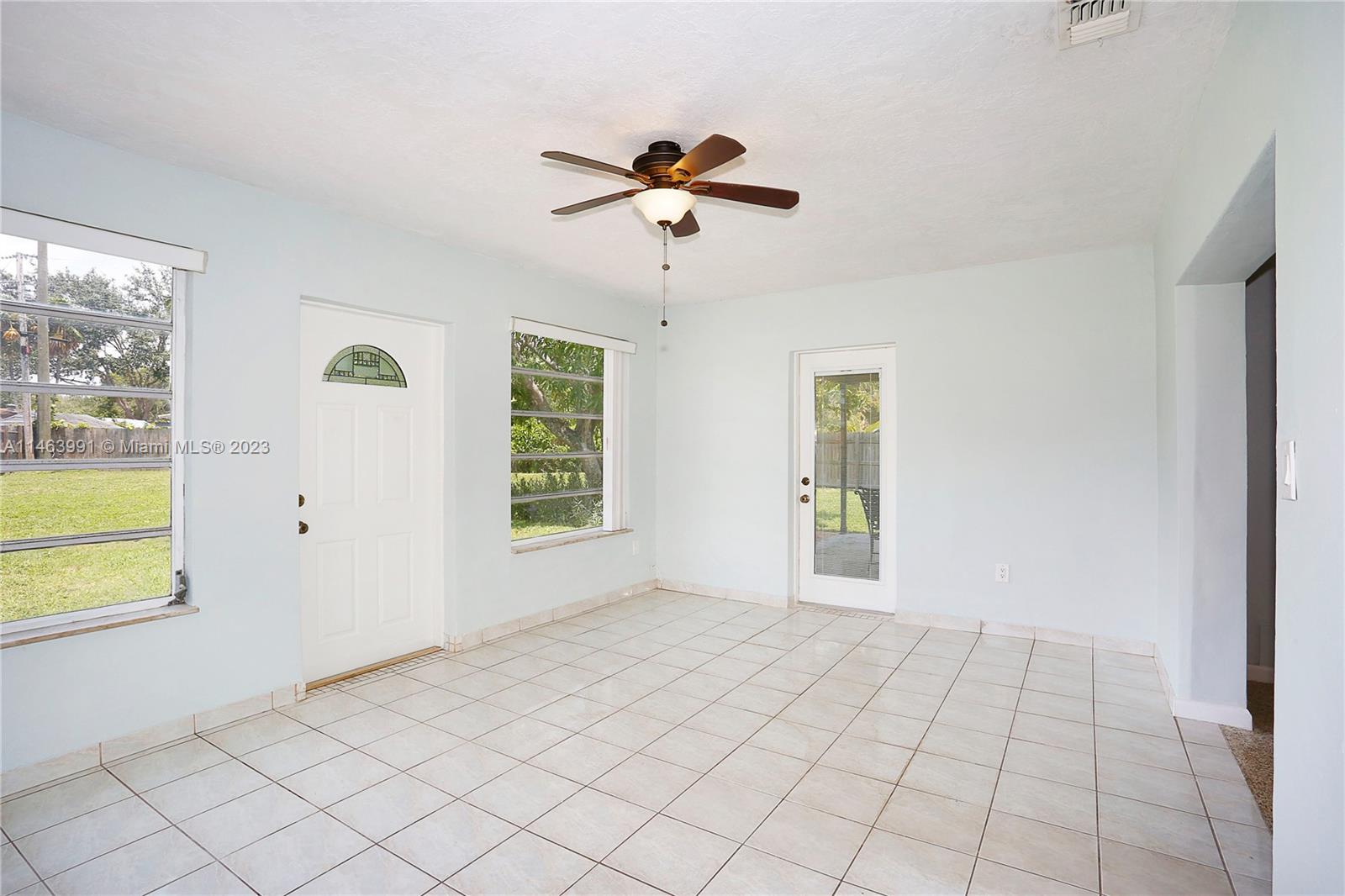 10045 Southwest 82nd Street Miami, FL 33173 - Photo 19 of 31 a view of an empty room with a window