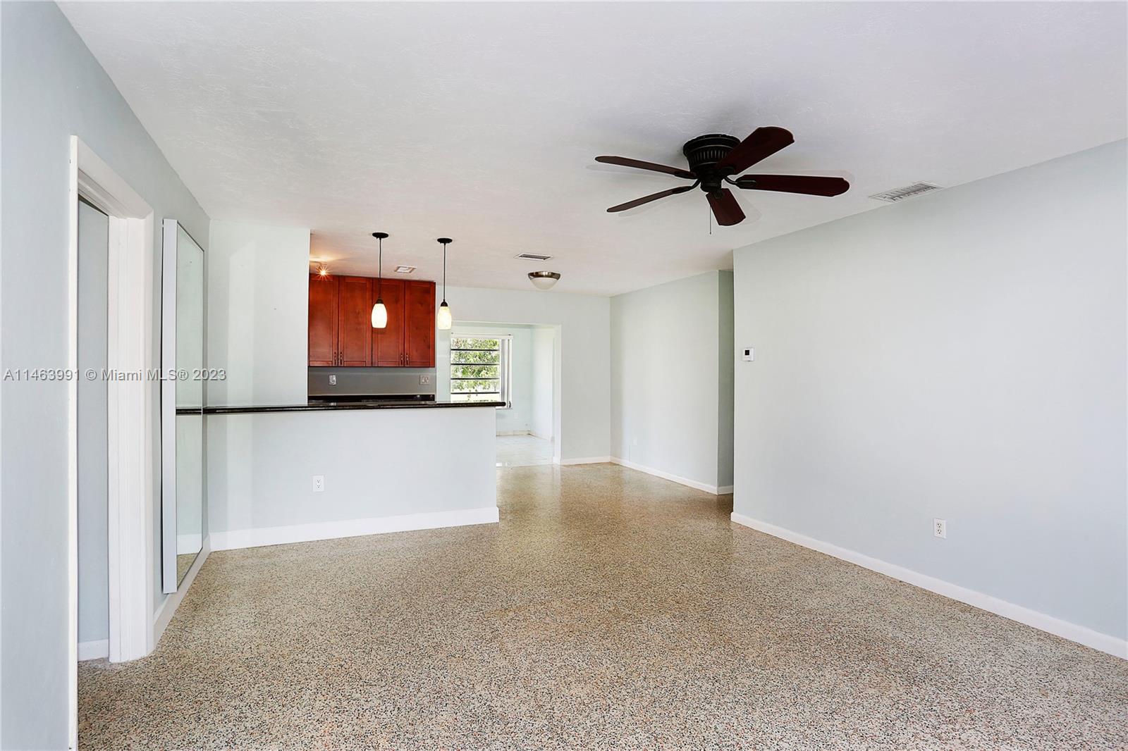 10045 Southwest 82nd Street Miami, FL 33173 - Photo 10 of 31 a view of a room with a ceiling fan and window