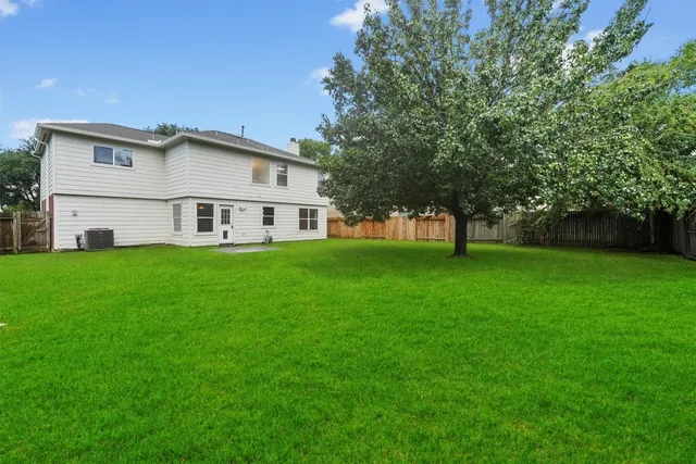 a front view of house with garden