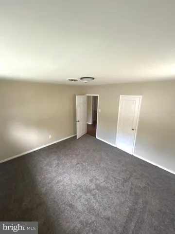 an empty room with a natural light