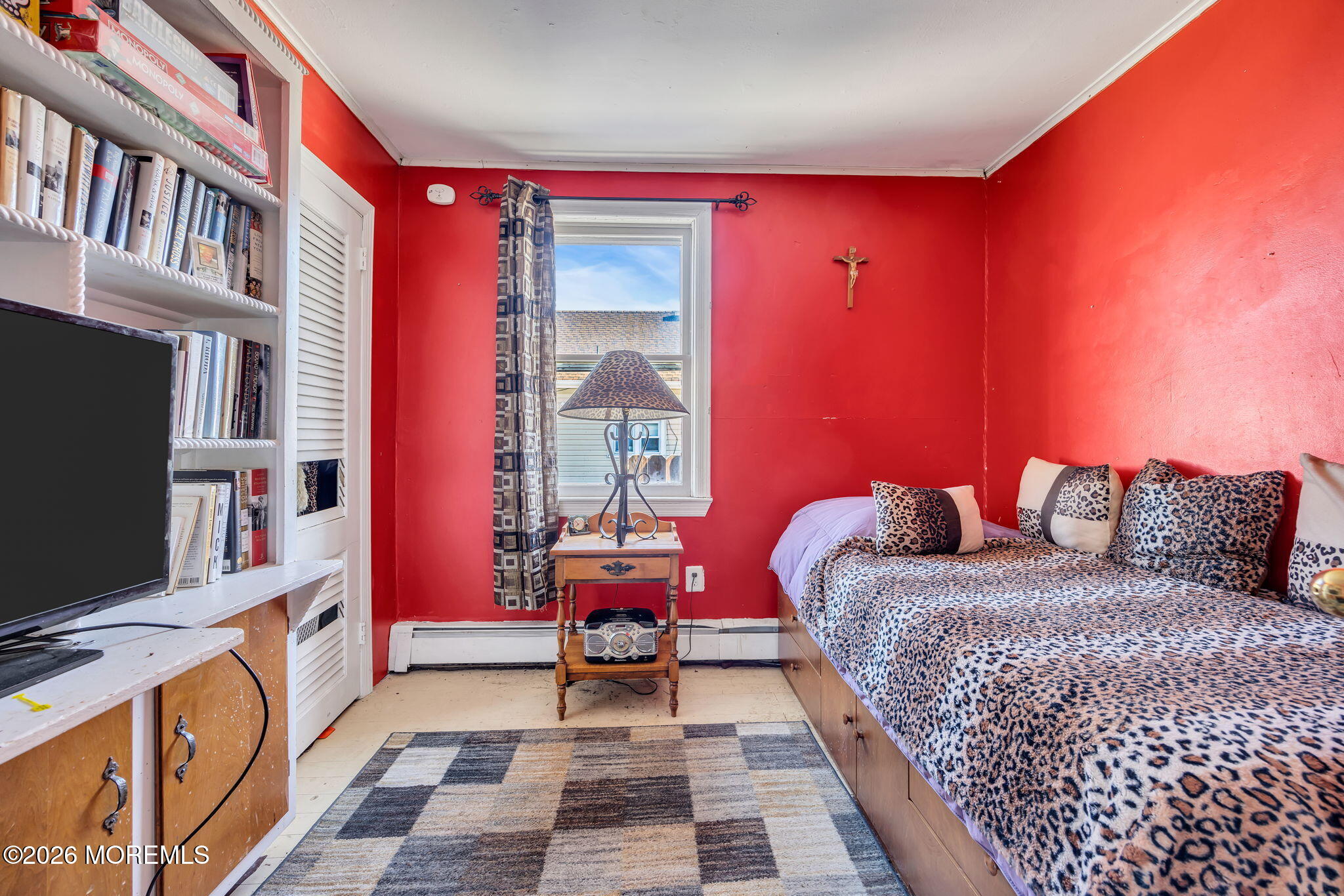 265 Thompson Avenue Middletown, NJ 07748 - Photo 14 of 35 a bedroom with bed and wooden floor