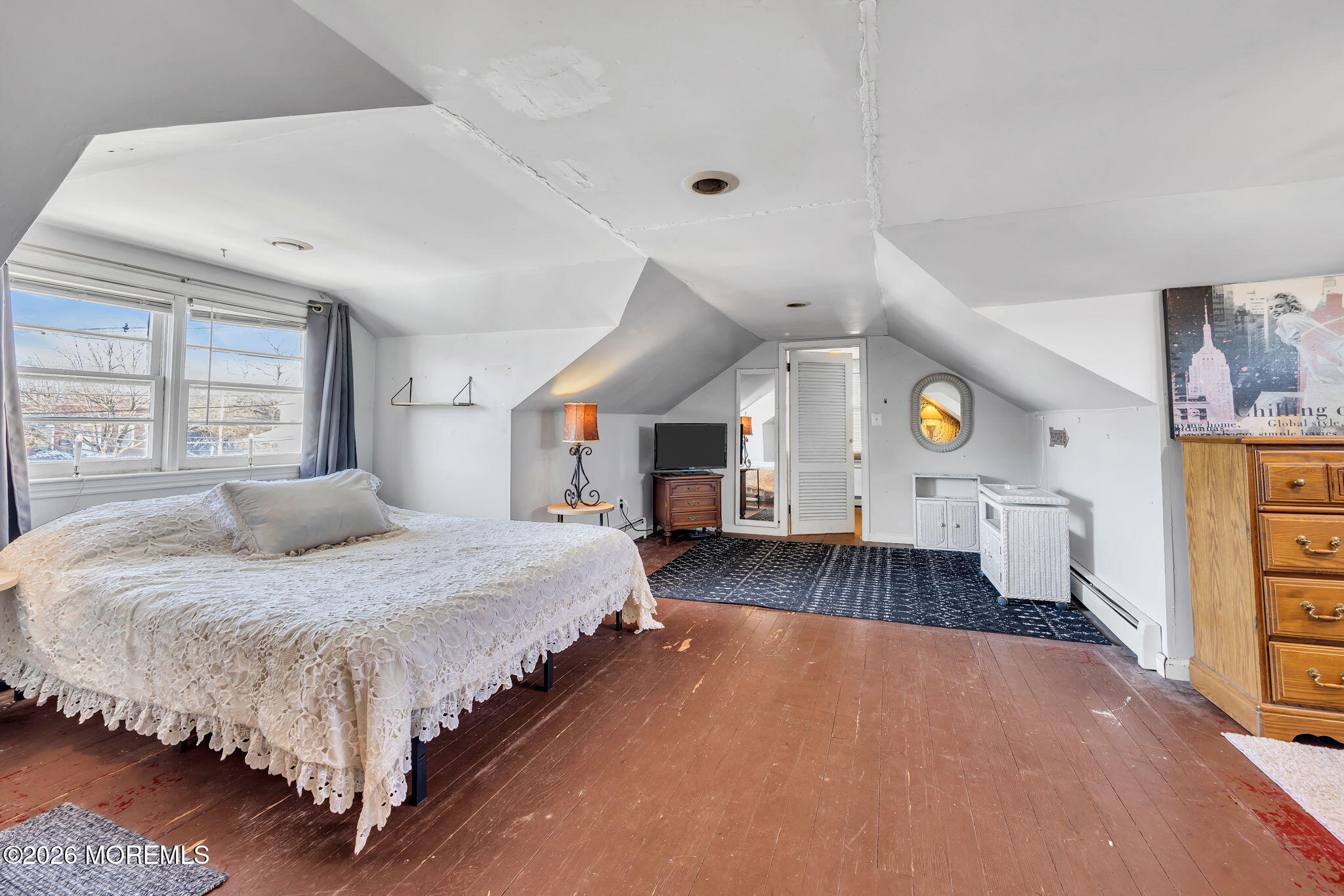 265 Thompson Avenue Middletown, NJ 07748 - Photo 29 of 35 a spacious bedroom with a bed and window