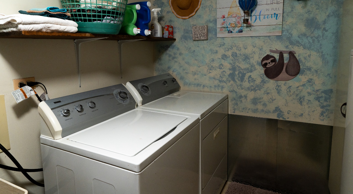 9140 South Pulaski Road, Unit 1W Oak Lawn, IL 60453 - Photo 13 of 17 a utility room with dryer and washer