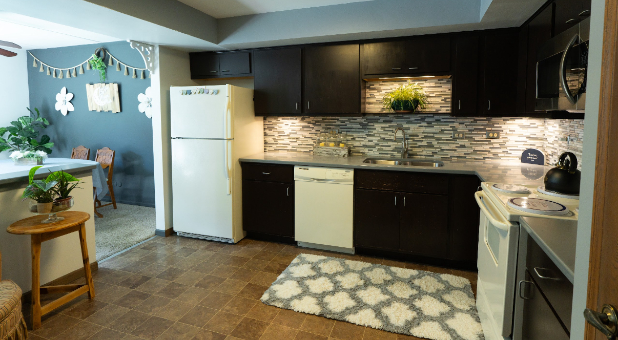 9140 South Pulaski Road, Unit 1W Oak Lawn, IL 60453 - Photo 9 of 17 a kitchen with refrigerator and cabinets
