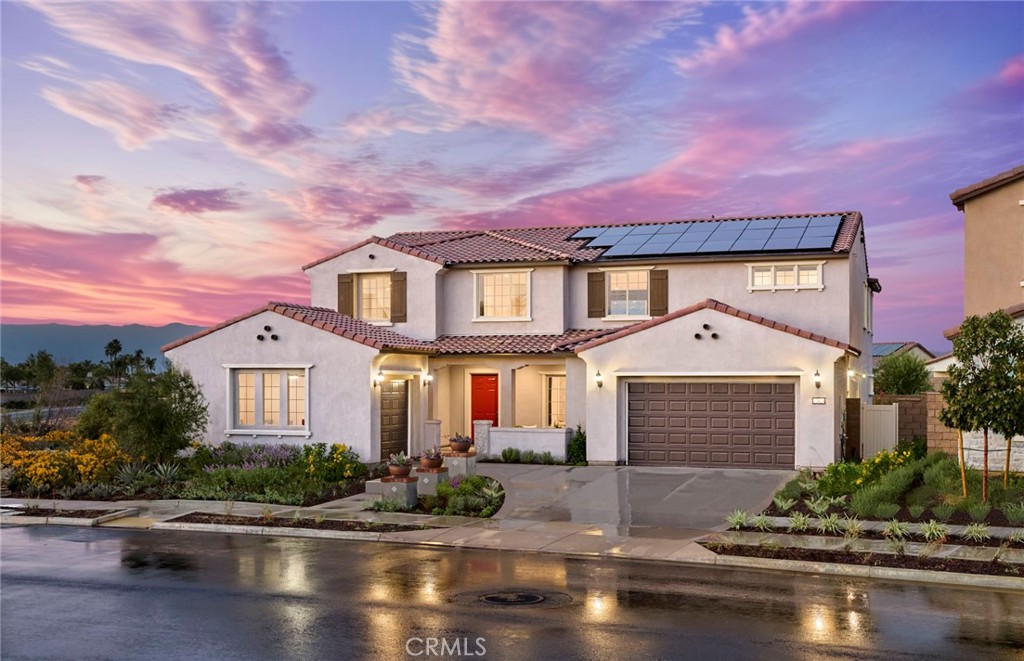 12828 Yountville Court Riverside, CA 92503 - Photo 1 of 11 a front view of a house with yard