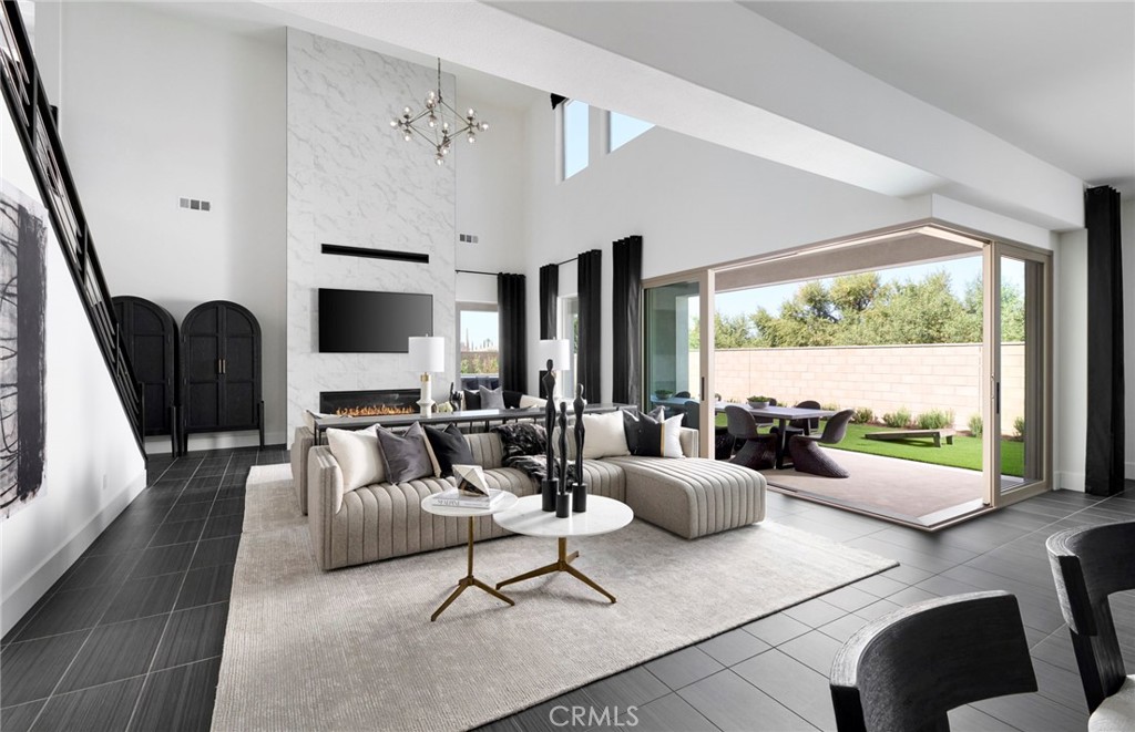 12828 Yountville Court Riverside, CA 92503 - Photo 4 of 11 a living room with furniture and a large window
