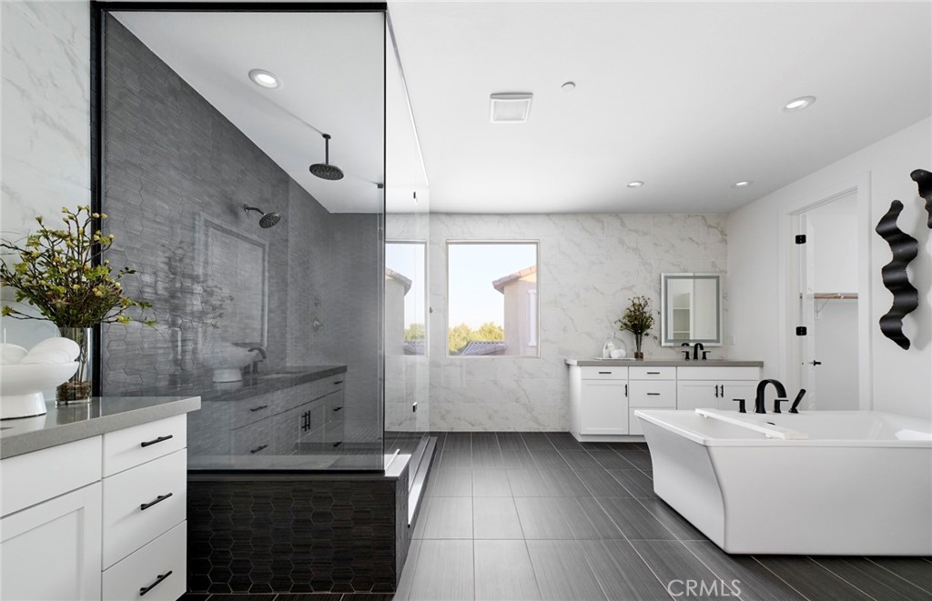 12828 Yountville Court Riverside, CA 92503 - Photo 9 of 11 a large white kitchen with a large window