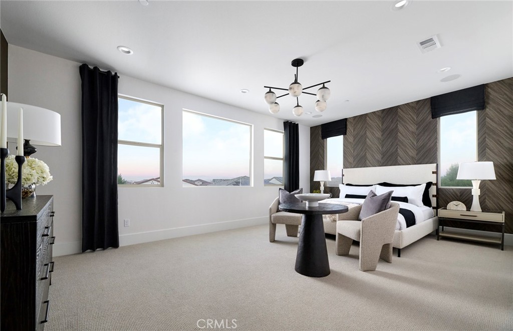 12828 Yountville Court Riverside, CA 92503 - Photo 10 of 11 a living room with furniture and a chandelier