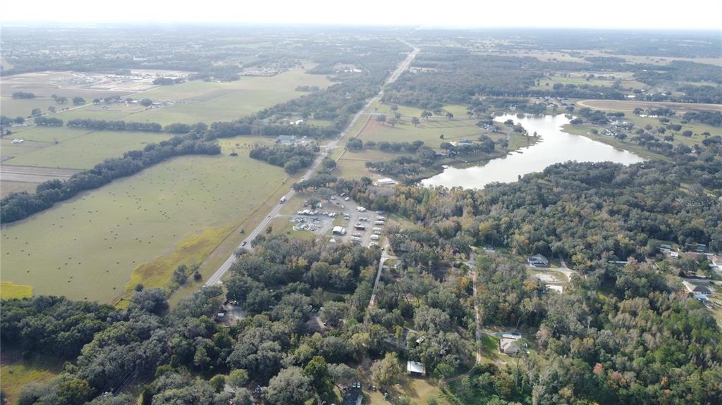 0 Southeast 65th Terrace Summerfield, FL 34491 - Photo 3 of 5 a view of a lake with a city