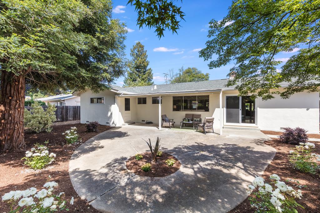 16239 Jacaranda Way Los Gatos, CA 95032 - Photo 17 of 20 a front view of a house with a patio
