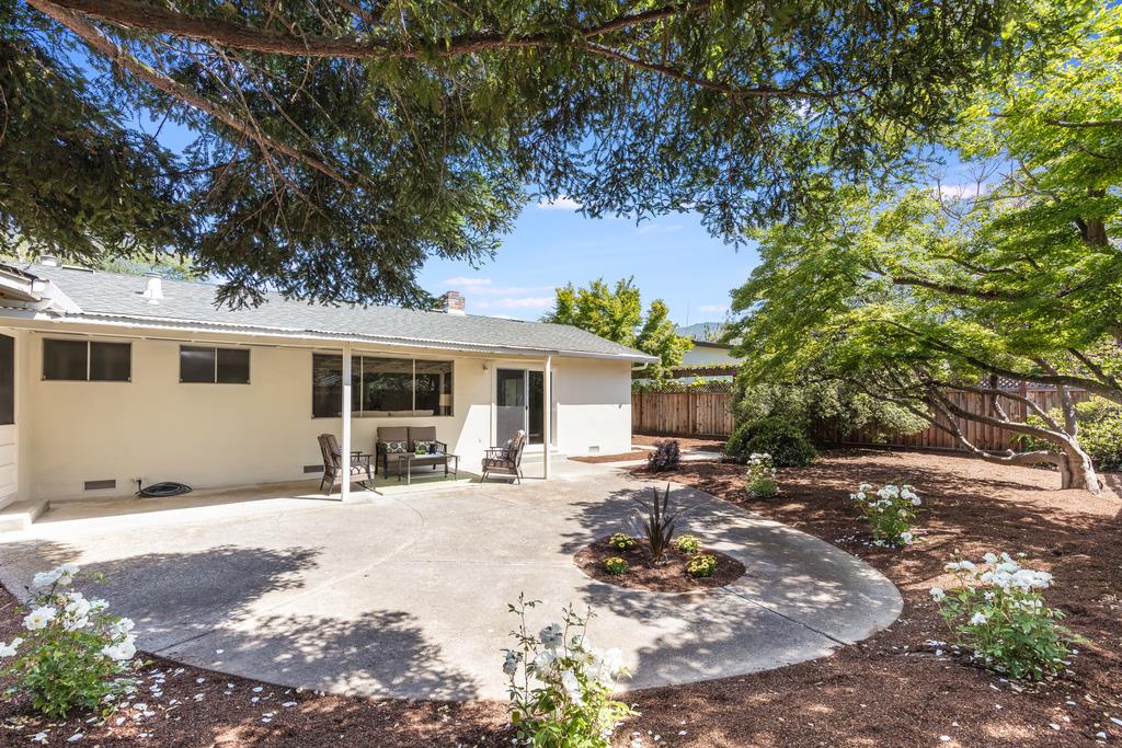 16239 Jacaranda Way Los Gatos, CA 95032 - Photo 18 of 20 a front view of a house with a patio