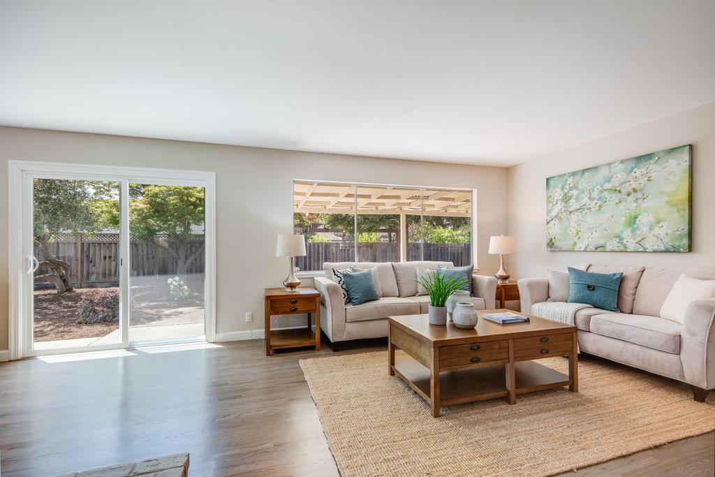 16239 Jacaranda Way Los Gatos, CA 95032 - Photo 2 of 20 a living room with furniture and large windows
