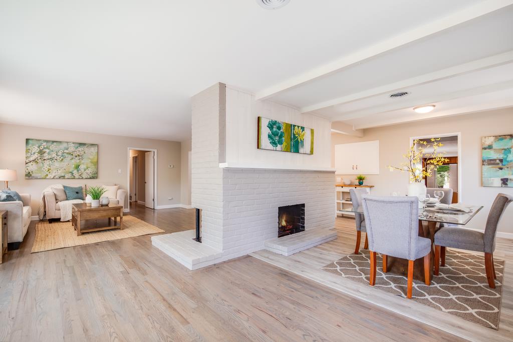 16239 Jacaranda Way Los Gatos, CA 95032 - Photo 6 of 20 a living room with furniture and a fireplace