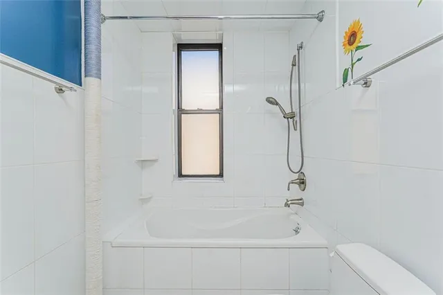 a bathroom with a bathtub