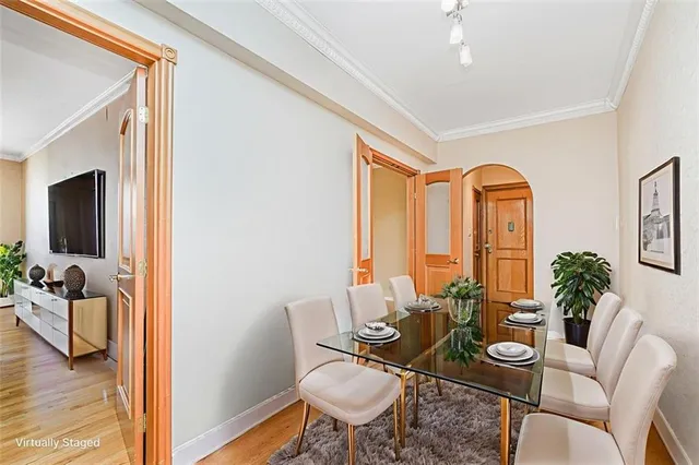 a view of a livingroom with furniture and a table