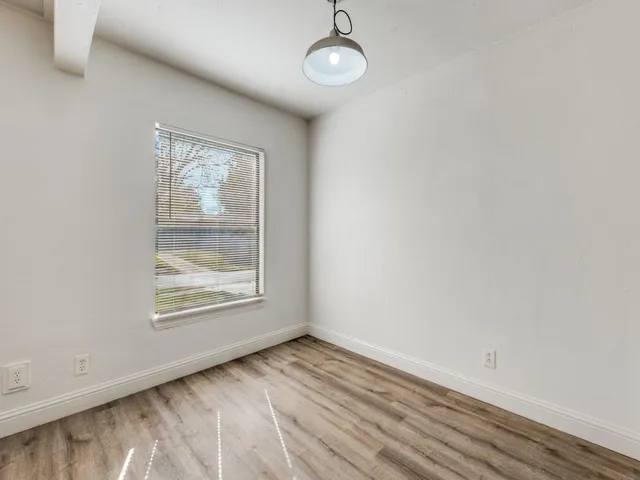 a view of a kitchen with a sink and dishwasher