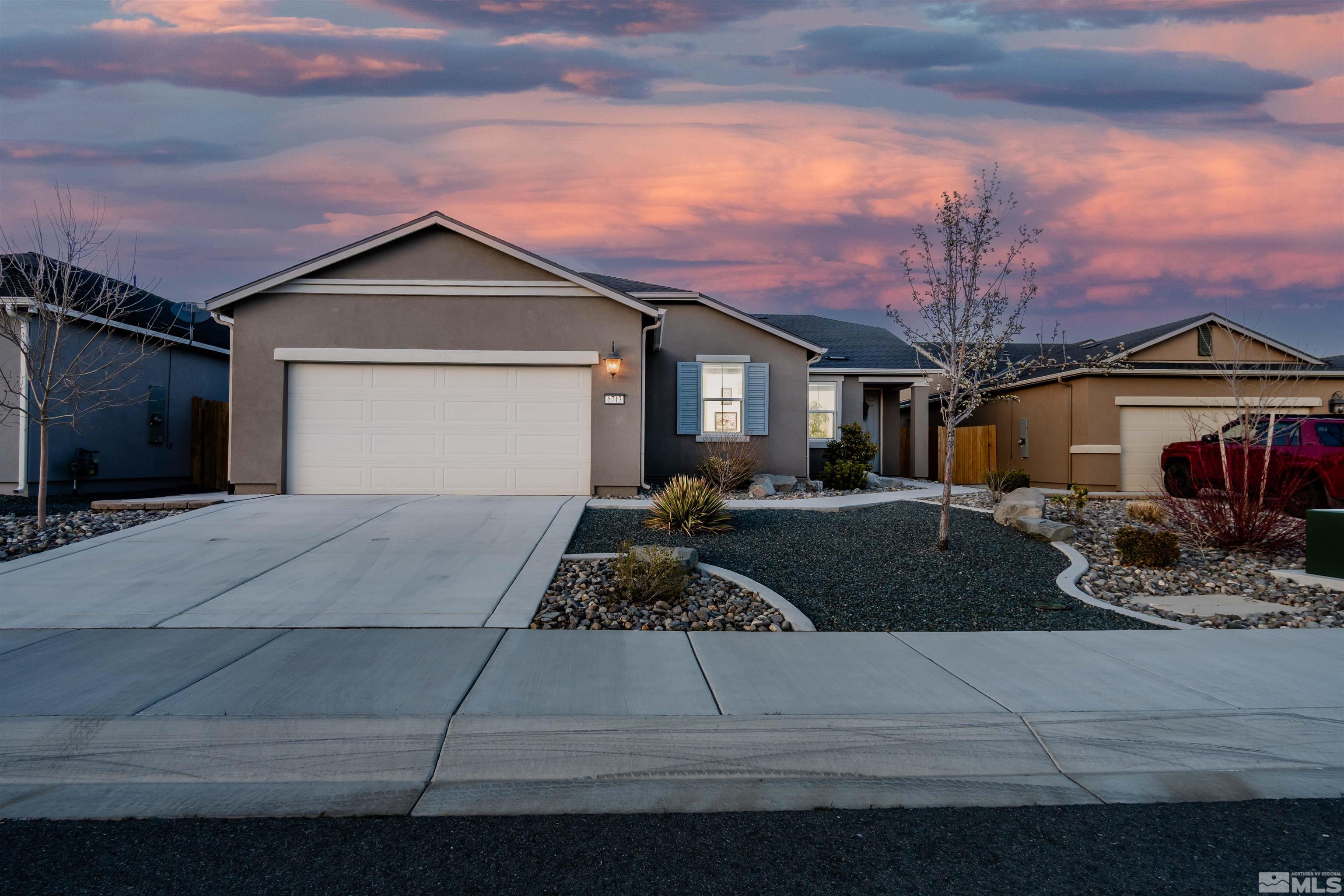 a front view of a house with entertaining space