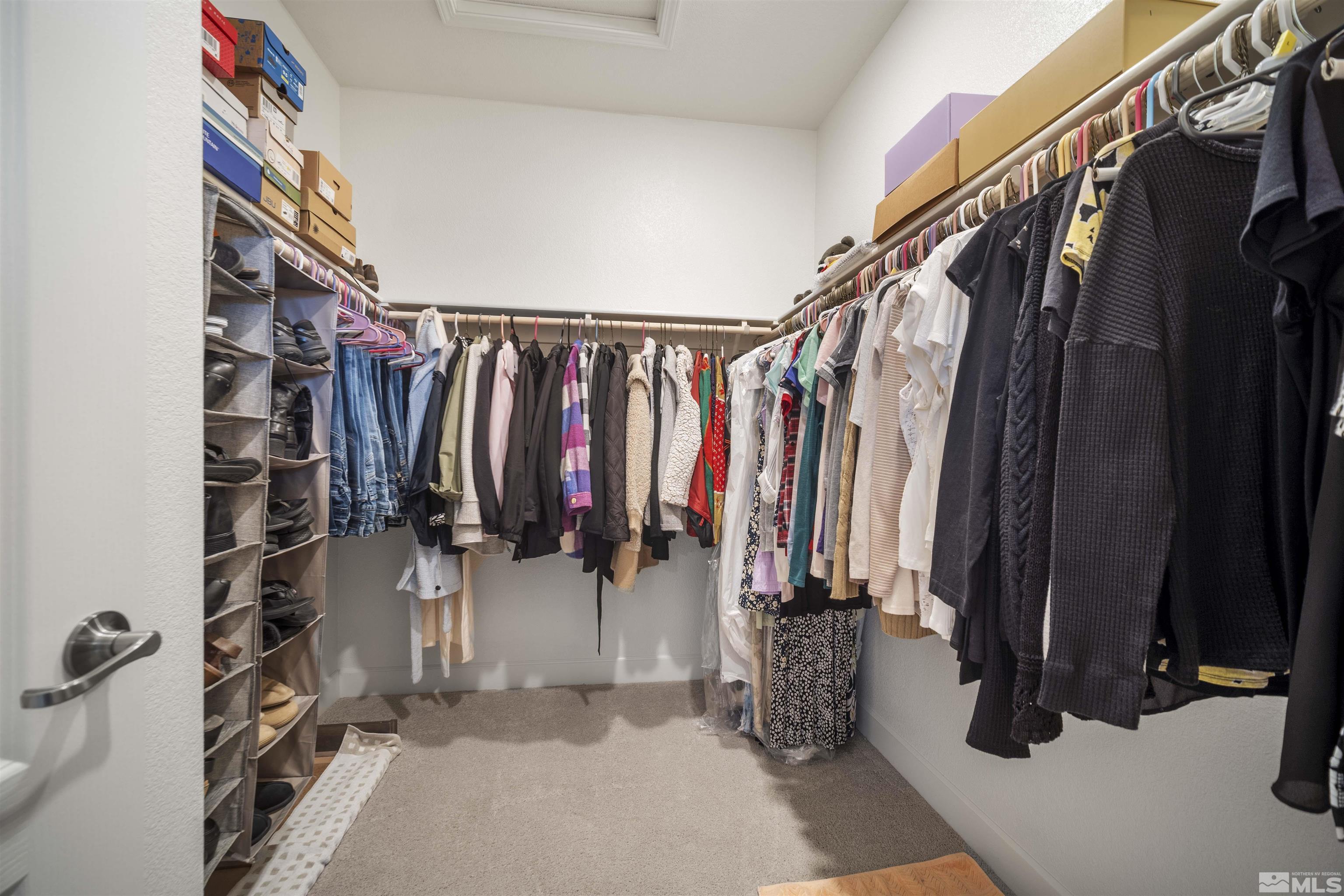 6713 Eagle Peak Drive Carson City, NV 89701 - Photo 20 of 40 a view of walk in closet with clothes