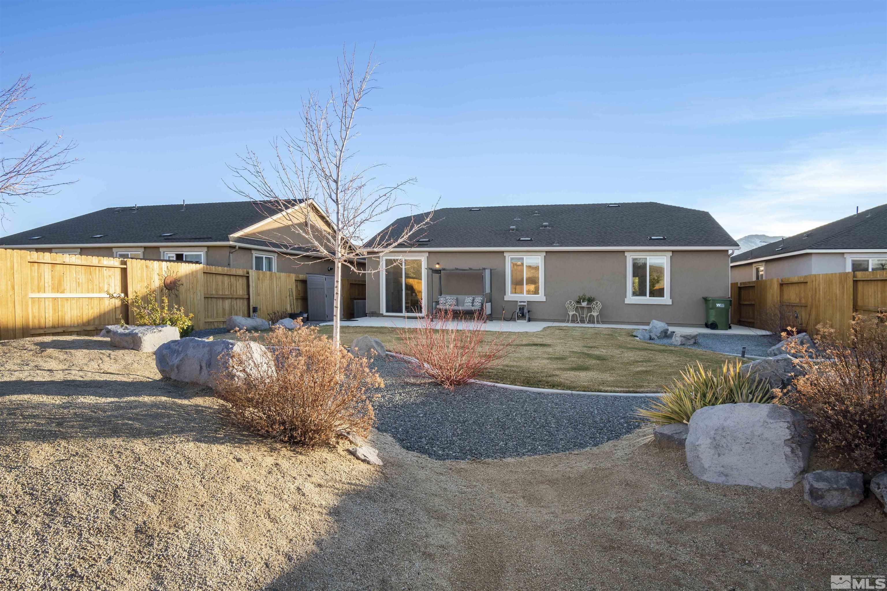 6713 Eagle Peak Drive Carson City, NV 89701 - Photo 37 of 40 a view of house with a yard