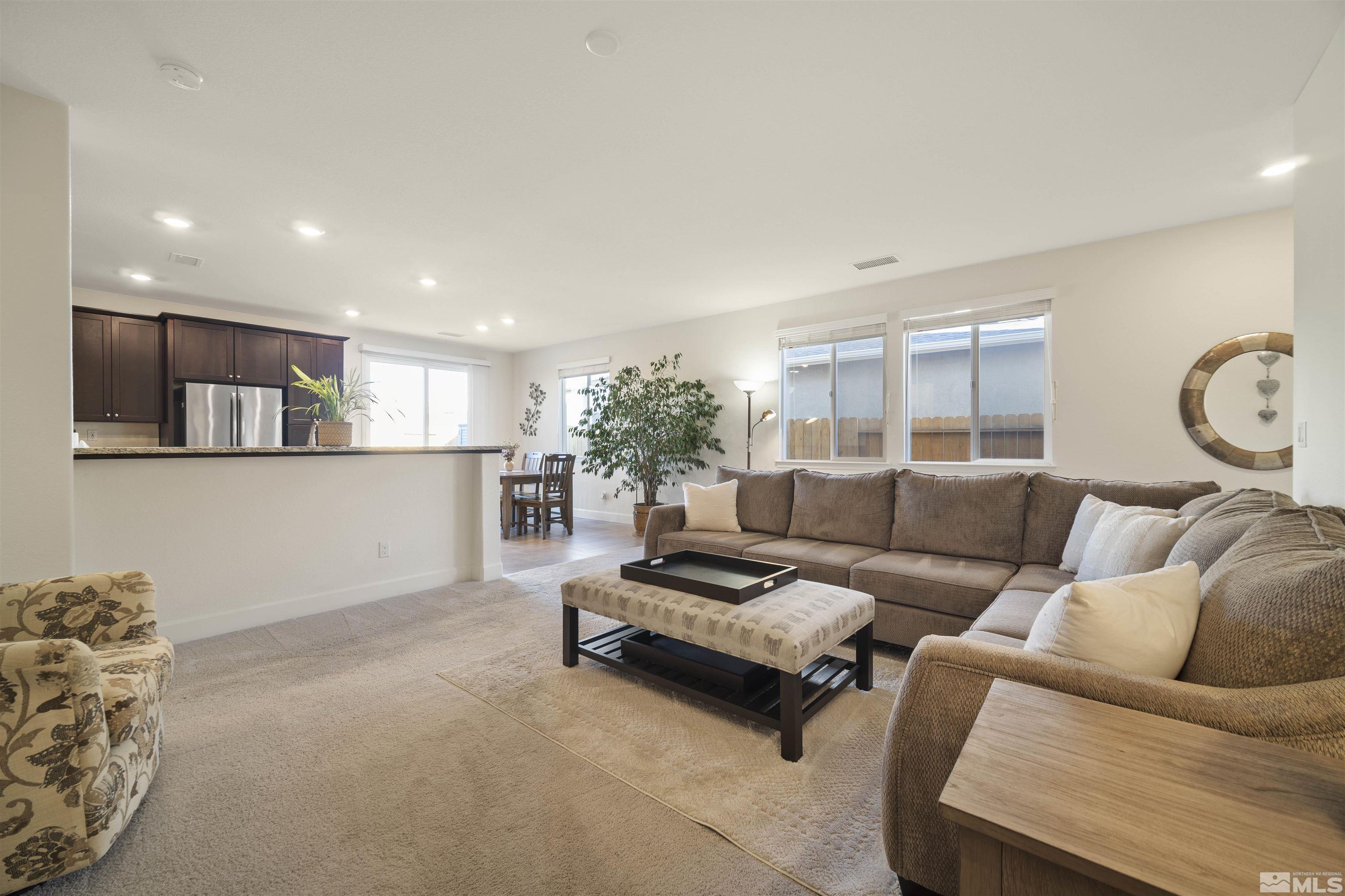 6713 Eagle Peak Drive Carson City, NV 89701 - Photo 10 of 40 a living room with furniture and wooden floor