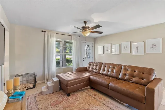 a living room with furniture and a window