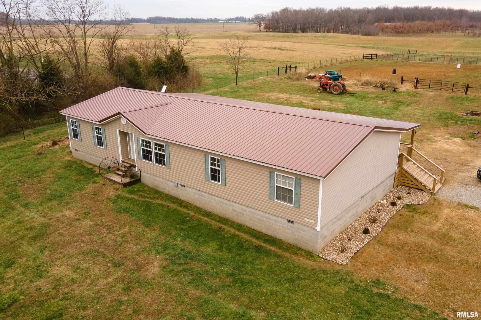 3996 Belgium Road Mulkeytown, IL 62865 - Photo 12 of 49 a aerial view of a house with a yard and lake view