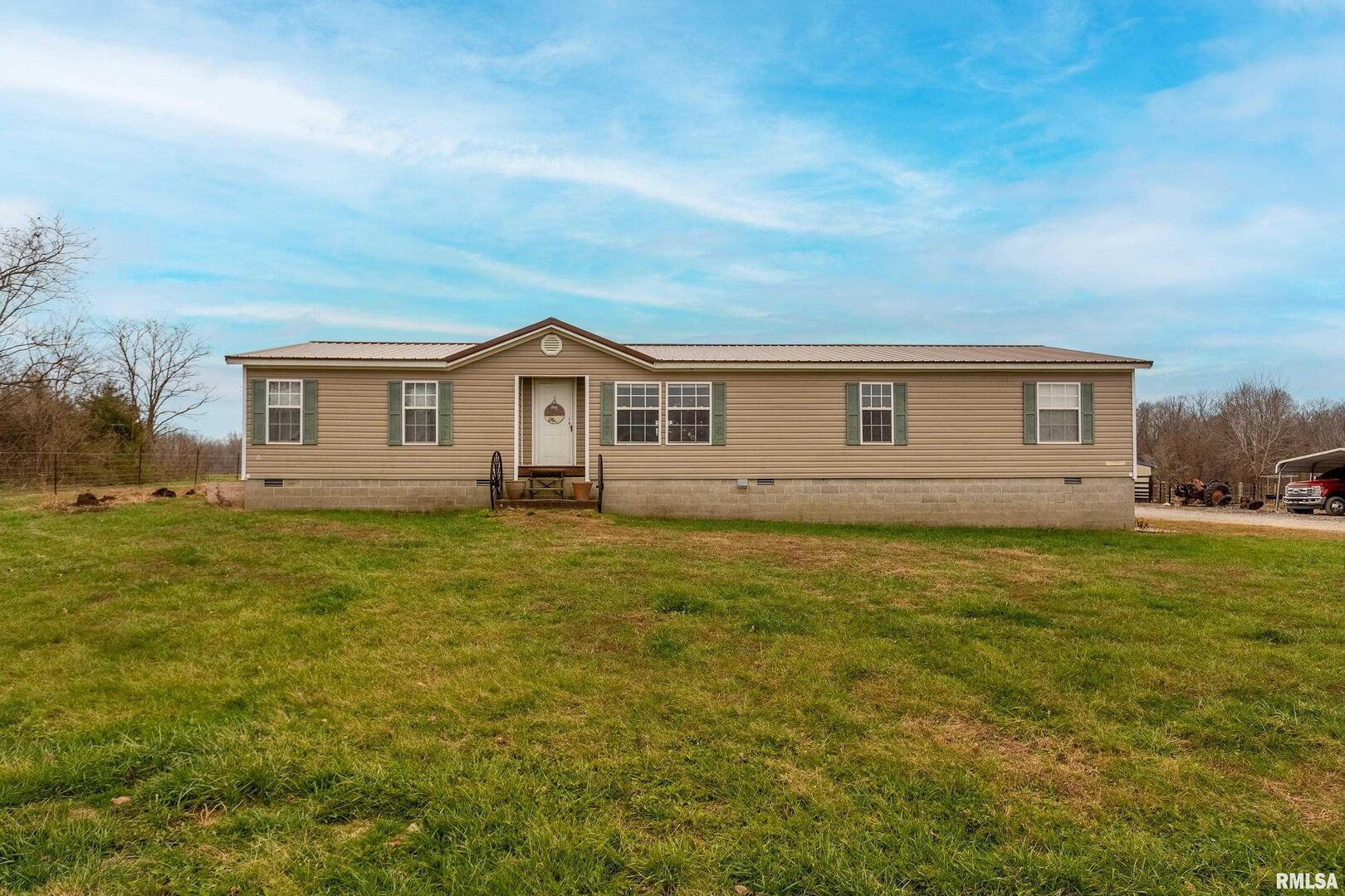 3996 Belgium Road Mulkeytown, IL 62865 - Photo 15 of 49 a view of a house with a big yard