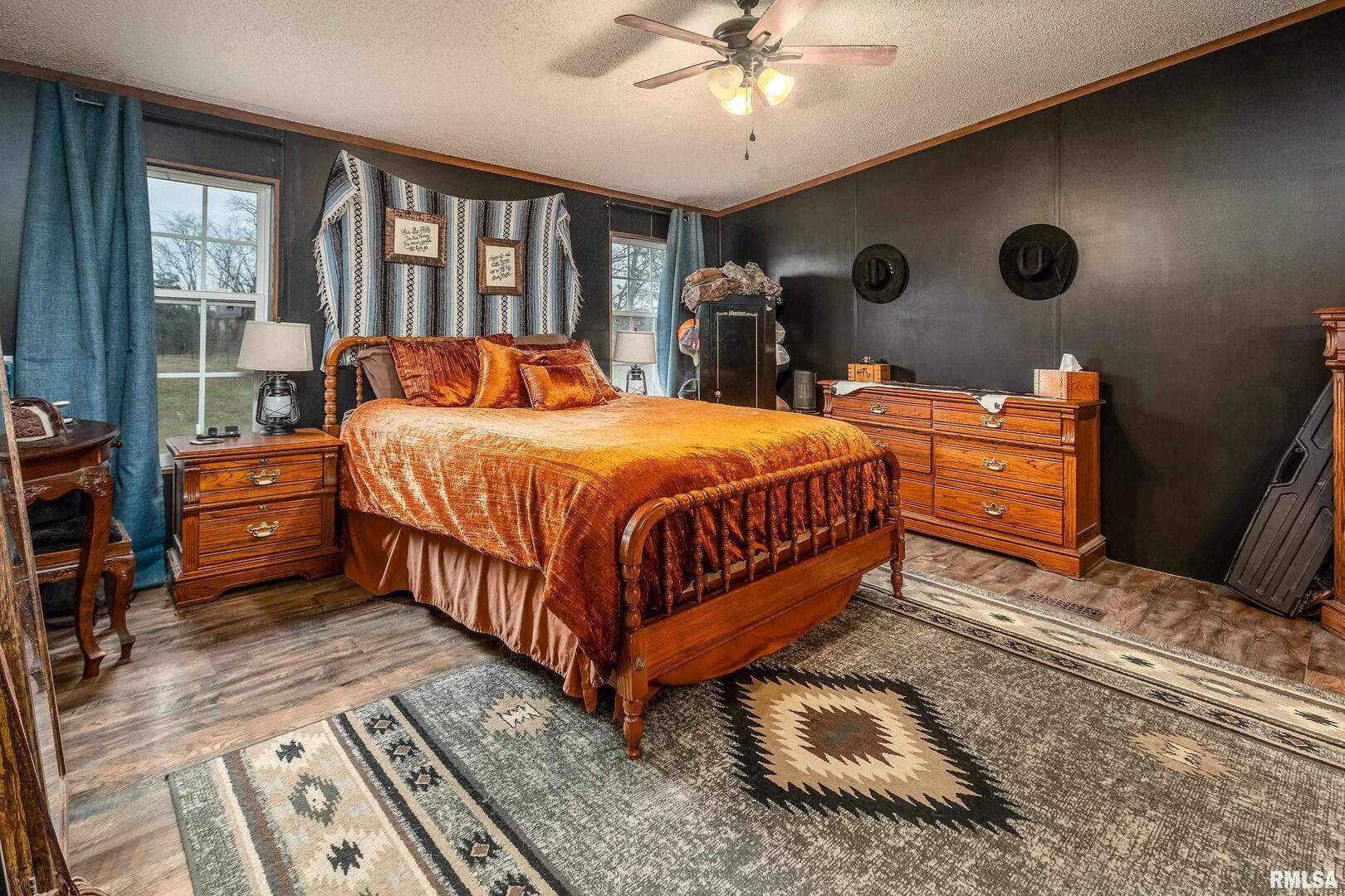 3996 Belgium Road Mulkeytown, IL 62865 - Photo 40 of 49 a bedroom with bed and wooden floor
