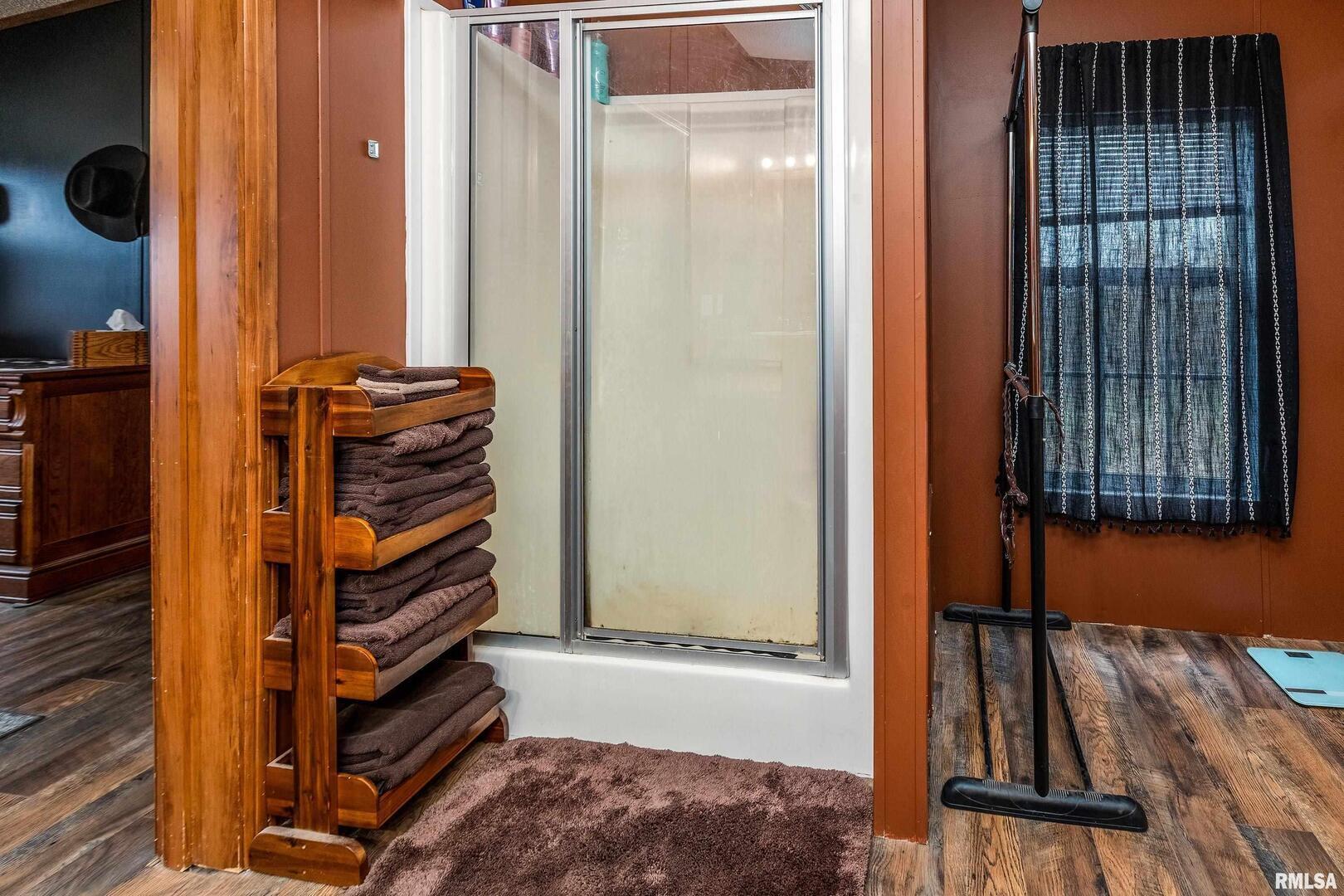 3996 Belgium Road Mulkeytown, IL 62865 - Photo 42 of 49 a view of a bedroom with wooden floor and windows