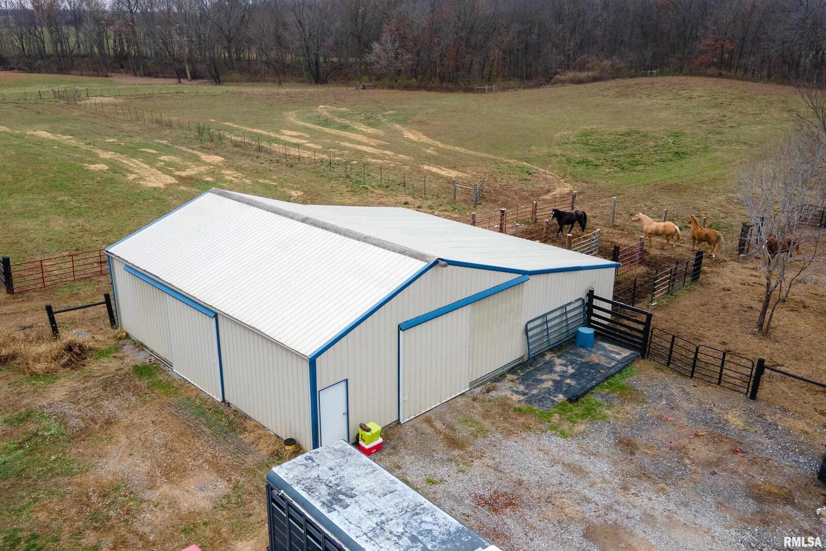 3996 Belgium Road Mulkeytown, IL 62865 - Photo 5 of 49 a view of a swimming pool with a yard