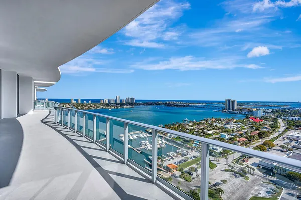 a view of a balcony with an ocean view