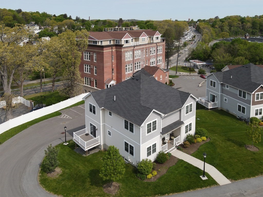 25 Eagle Nest Road, Unit 25 Clinton, MA 01510 - Photo 4 of 38 an aerial view of a house with a yard
